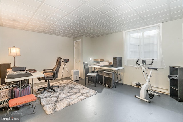 office area featuring concrete flooring