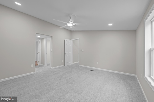 spare room featuring ceiling fan, baseboards, carpet flooring, and recessed lighting