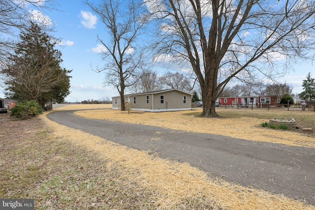 exterior space with aphalt driveway