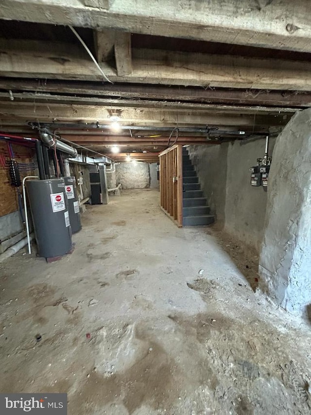 unfinished basement with water heater