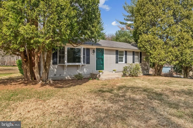 view of front of house with a front yard