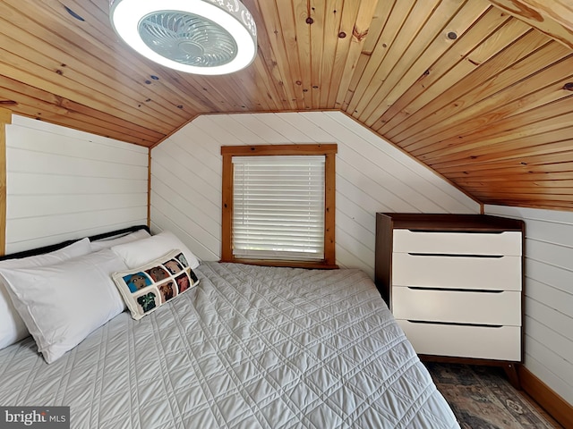 unfurnished bedroom featuring wood walls, wood ceiling, and vaulted ceiling