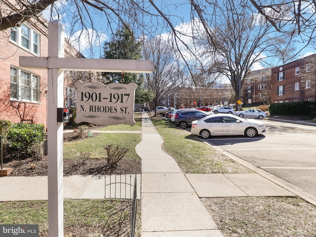 view of road with curbs and sidewalks