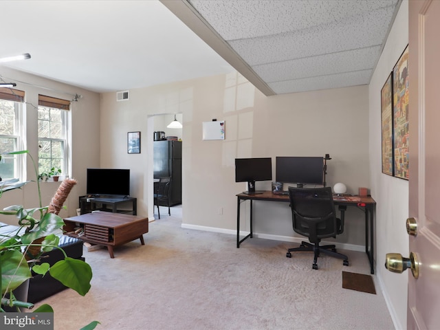 office featuring visible vents, baseboards, and carpet flooring