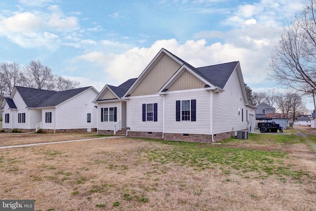 view of front of house featuring crawl space, a front yard, and entry steps