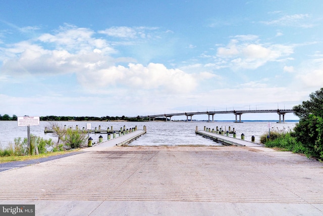 dock area with a water view