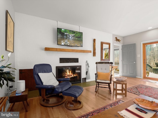 1 Timber Run Ct, Reisterstown, MD 21136 - sitting room with a glass covered fireplace and wood finished floors