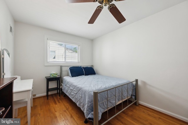 10108 Kinross Ave, Silver Spring, MD 20901 - bedroom featuring baseboards, a ceiling fan, wood finished floors, and visible vents