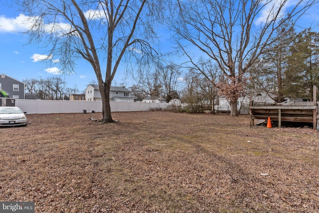 view of yard featuring a fenced backyard