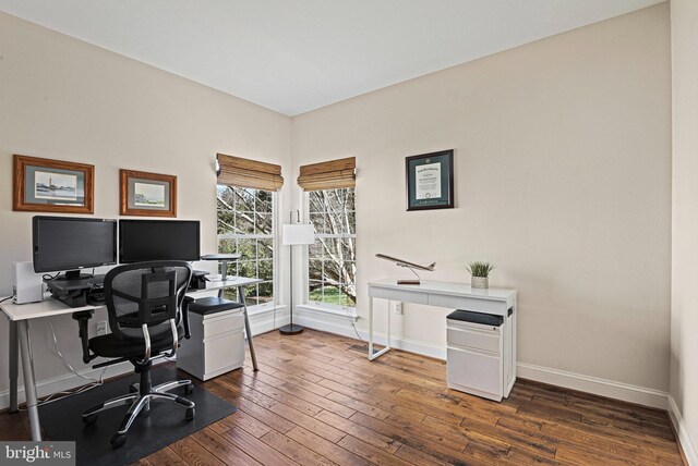 office space featuring baseboards and hardwood / wood-style flooring