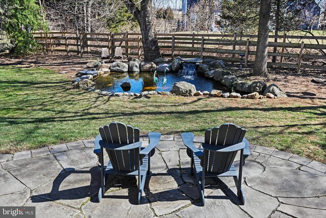 view of yard featuring a patio area and fence