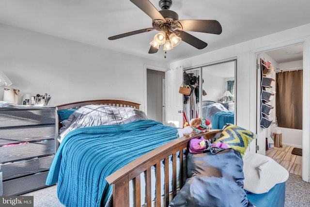 bedroom featuring a closet and a ceiling fan