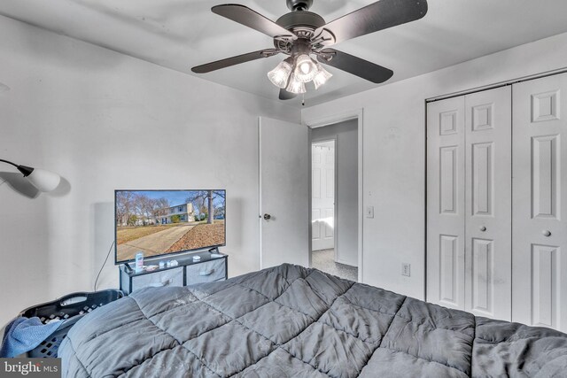 bedroom featuring a ceiling fan and a closet