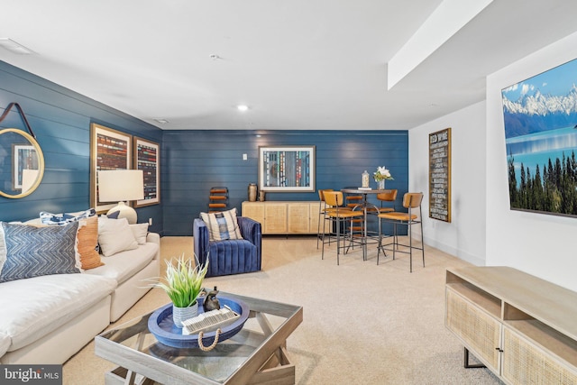 living room featuring recessed lighting, carpet flooring, and baseboards