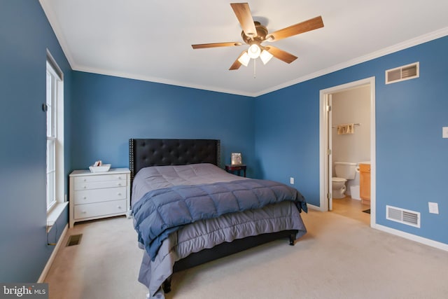 carpeted bedroom featuring ornamental molding, visible vents, and baseboards