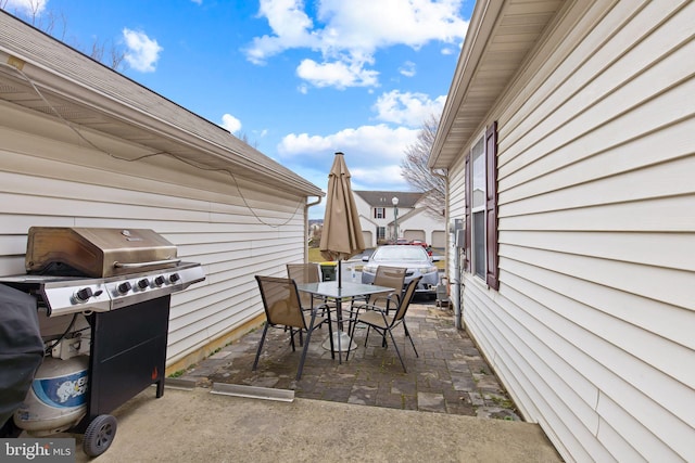 view of patio / terrace with outdoor dining area and area for grilling