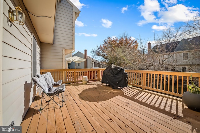 wooden terrace with grilling area