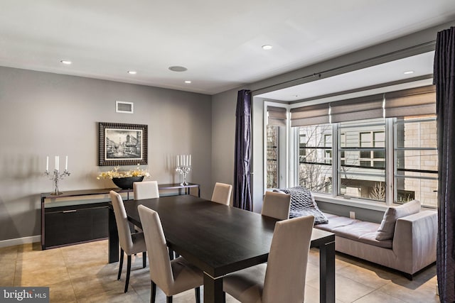 dining area with baseboards, light tile patterned flooring, visible vents, and recessed lighting