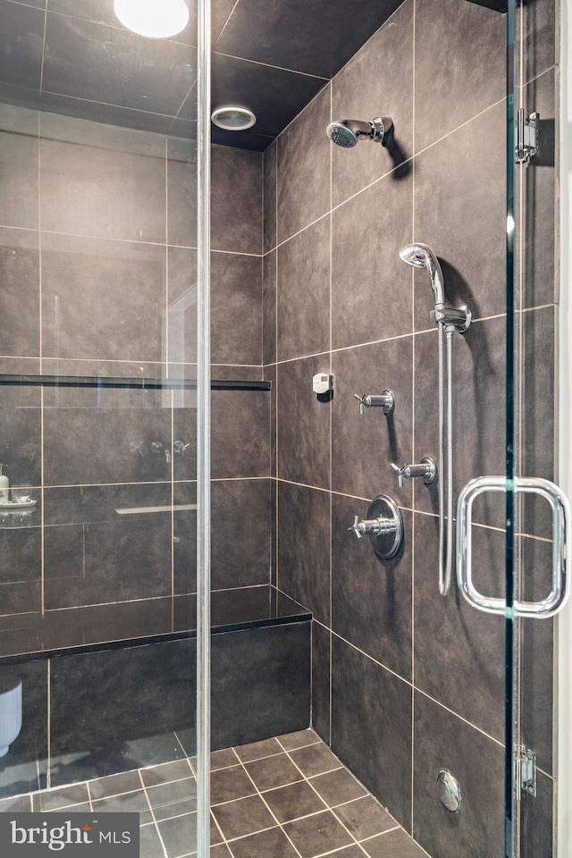 bathroom with a stall shower