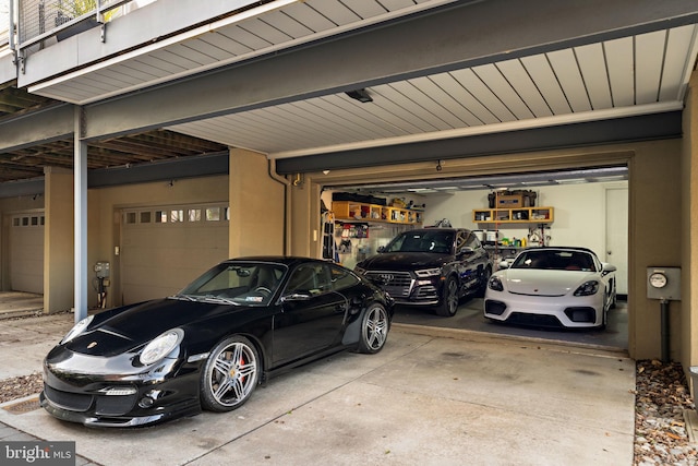 garage featuring driveway