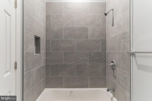 full bathroom with shower / washtub combination