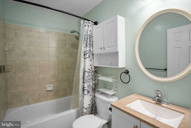 bathroom with vanity, toilet, and shower / tub combo with curtain