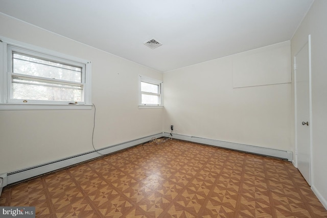 empty room with visible vents and light floors