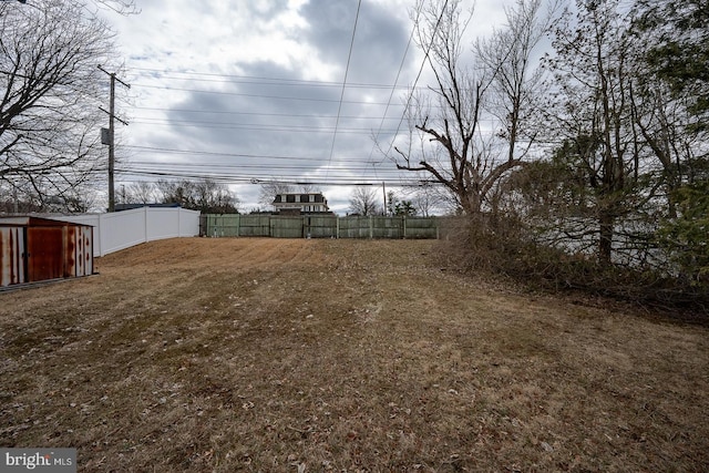 view of yard with fence