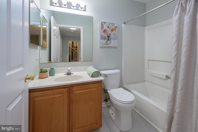 bathroom with vanity, shower / bath combo with shower curtain, tile patterned flooring, and toilet