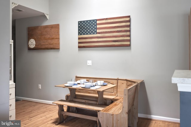 665 Constellation Sq SE Unit F, Leesburg, VA 20175 - dining space featuring light wood finished floors and baseboards