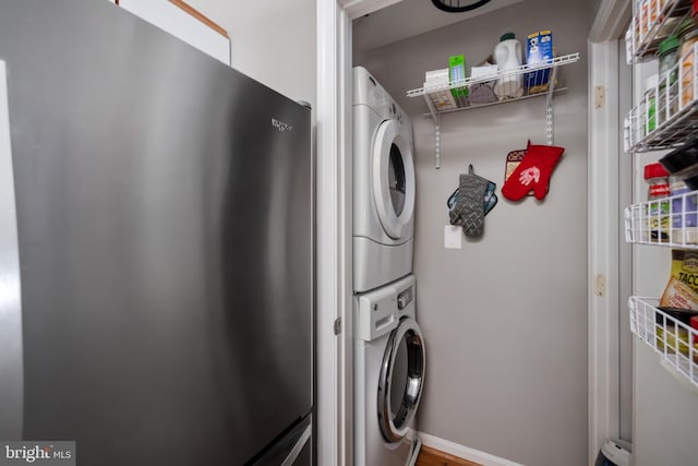 665 Constellation Sq SE Unit F, Leesburg, VA 20175 - washroom featuring estacked washer and dryer