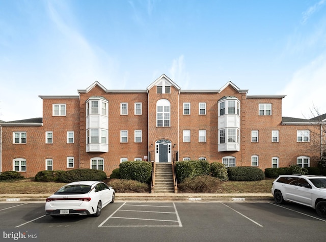 665 Constellation Sq SE Unit F, Leesburg, VA 20175 - view of property with uncovered parking