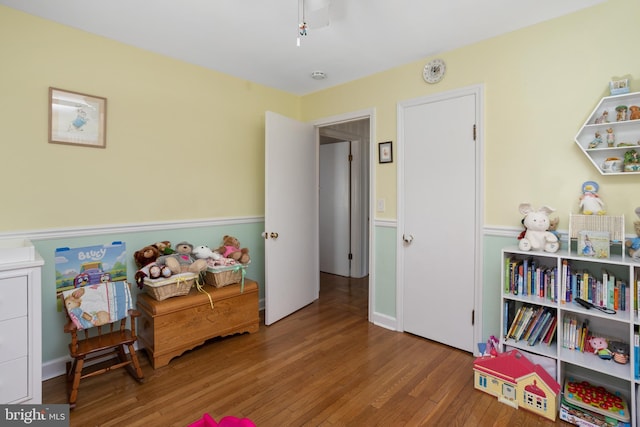 recreation room with wood finished floors