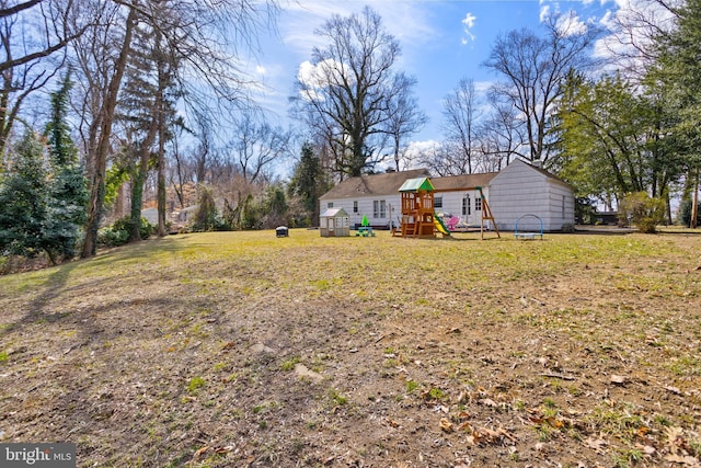 view of yard with a playground