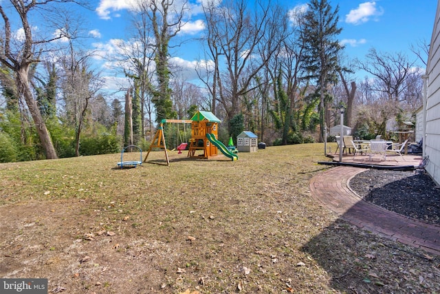 view of play area with a lawn