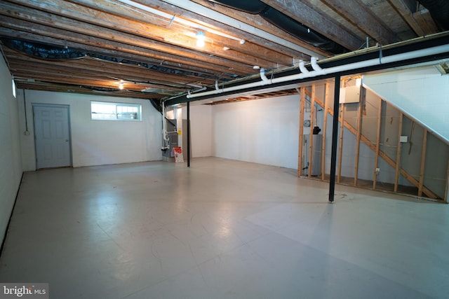 basement featuring heating unit