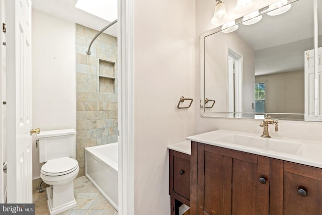 full bathroom featuring toilet, bathing tub / shower combination, and vanity