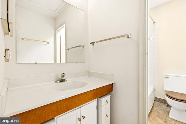 bathroom featuring shower / tub combination, vanity, and toilet