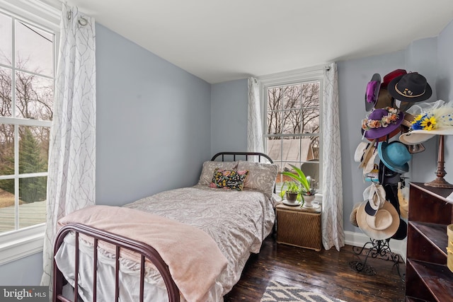 bedroom with wood finished floors