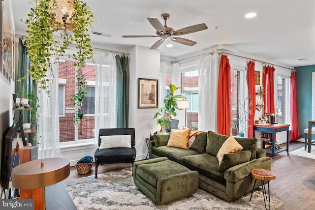 sitting room featuring ceiling fan, wood finished floors, visible vents, and recessed lighting