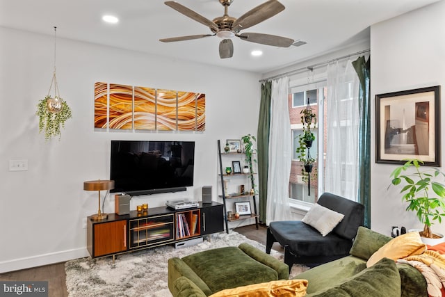 living room featuring recessed lighting, visible vents, a ceiling fan, wood finished floors, and baseboards