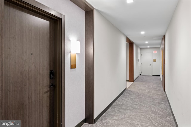 hallway featuring recessed lighting