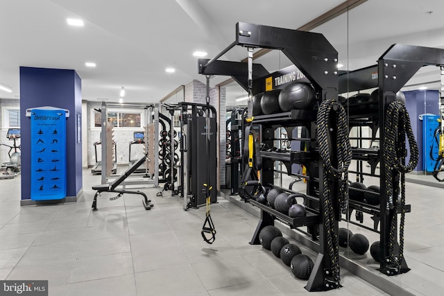 gym featuring recessed lighting