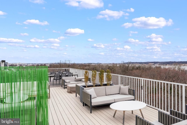 wooden deck with outdoor lounge area