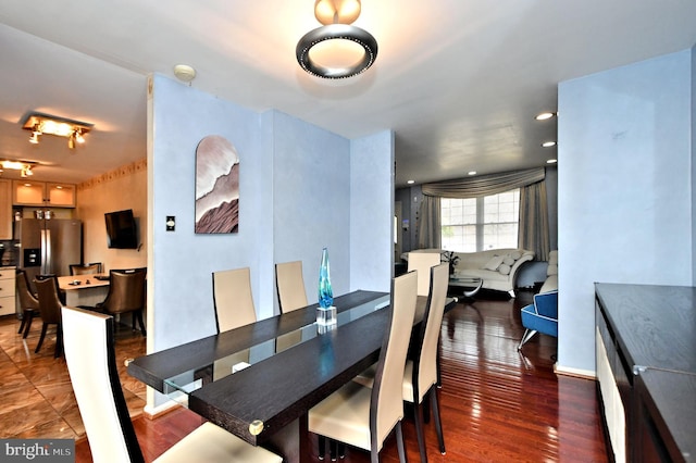 dining room featuring recessed lighting and wood finished floors