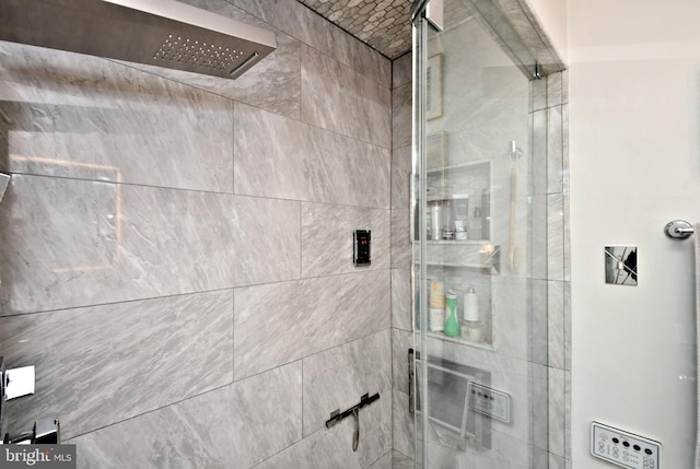 full bathroom featuring a shower stall