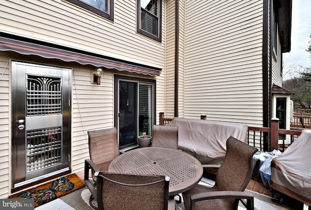 exterior space featuring outdoor dining area