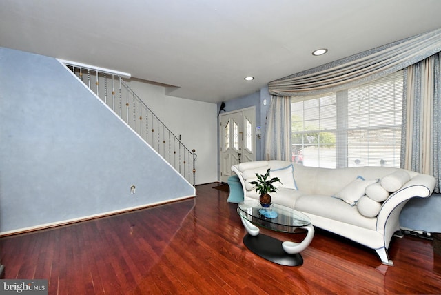 living room with stairs, wood finished floors, and recessed lighting