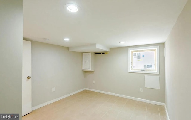 below grade area with recessed lighting and baseboards