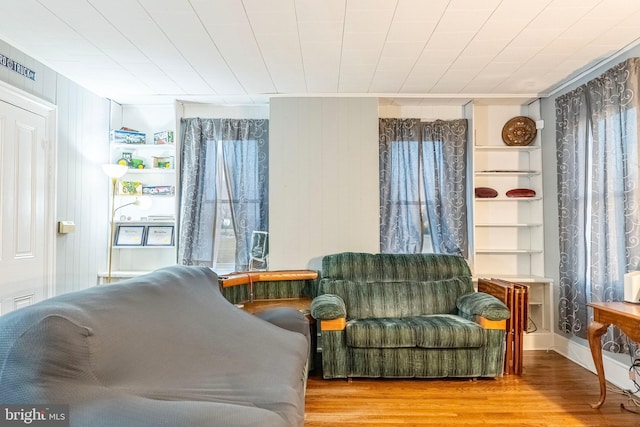 sitting room with wood finished floors